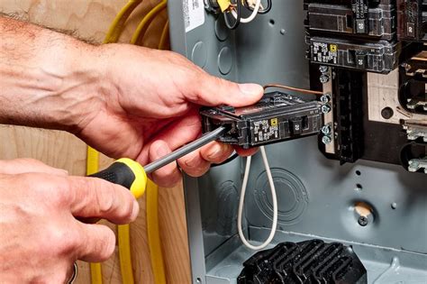 changing out electrical breaker box|replacing fuse in breaker box.